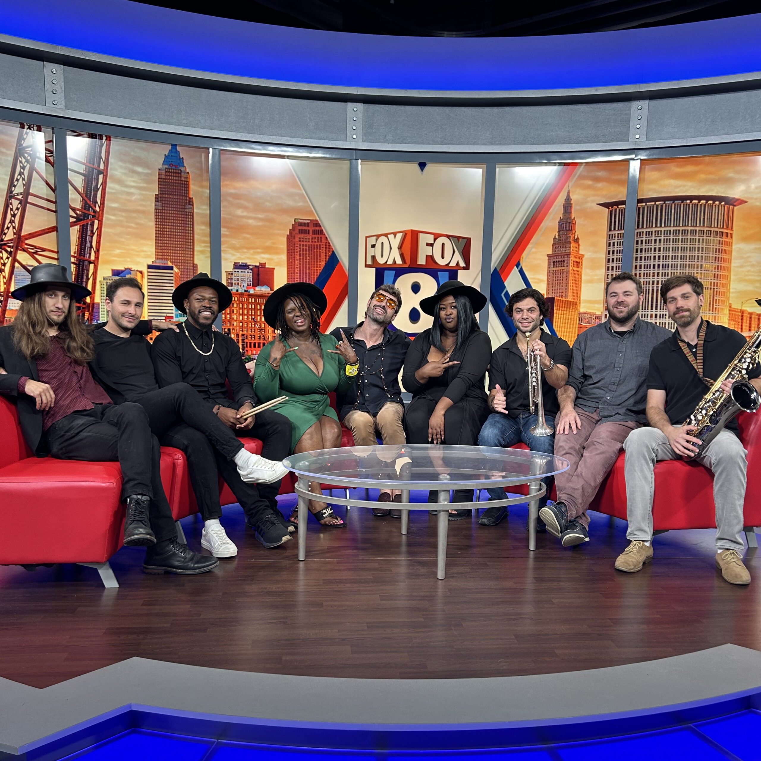 Apostle Jones band members sitting on couch