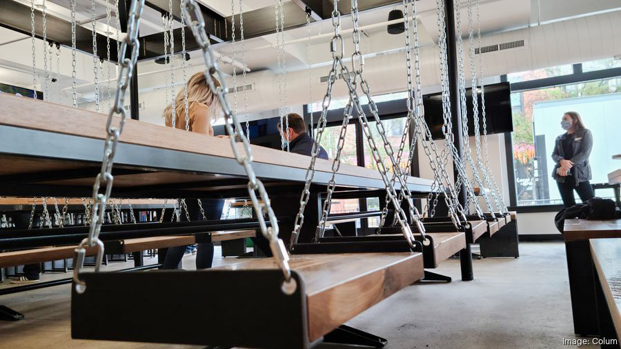 Industrial swing seats at Saucy Columbus.